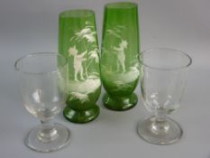 A PAIR OF GREEN MARY GREGORY TAPERED GLASS VASES, the paintwork of a little hatted boy by a tree, 20