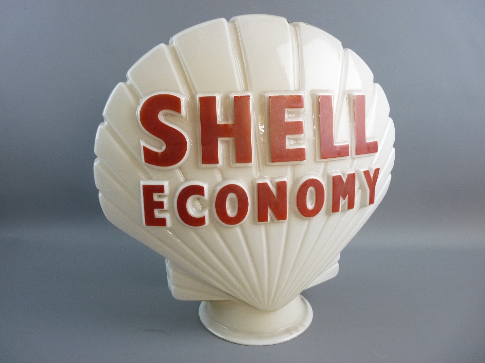 A SHELL ECONOMY GLASS PETROL PUMP GLOBE with raised red lettering, marked to the base 'Hail Ware,