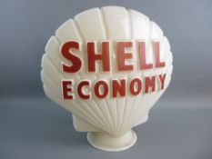 A SHELL ECONOMY GLASS PETROL PUMP GLOBE with raised red lettering, marked to the base 'Hail Ware,