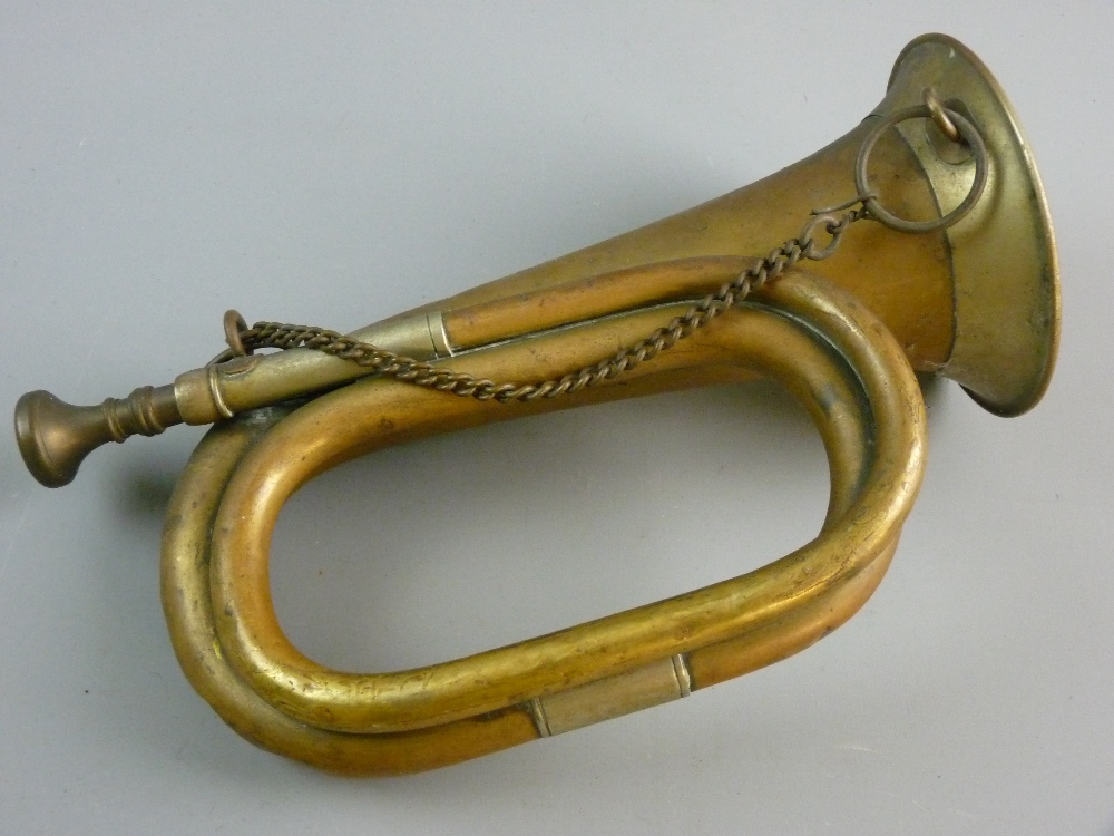 A WORLD WAR II PERIOD BRASS BUGLE marked 'Meinel & Herold, Klingenthal' with silvered mounts and