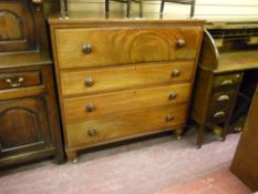 AN EARLY VICTORIAN MAHOGANY CHEST of four long graduated drawers with turned wooden knobs, 117 cms