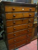 AN EARLY VICTORIAN MAHOGANY CHEST of seven long graduated drawers all with turned wooden knobs,