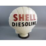A SHELL DIESOLINE GLASS PETROL PUMP GLOBE with raised red and black lettering, the base stamped '