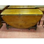 A LARGE ANTIQUE OAK GATE LEG DINING TABLE, oval topped with single end drawer on turned and block