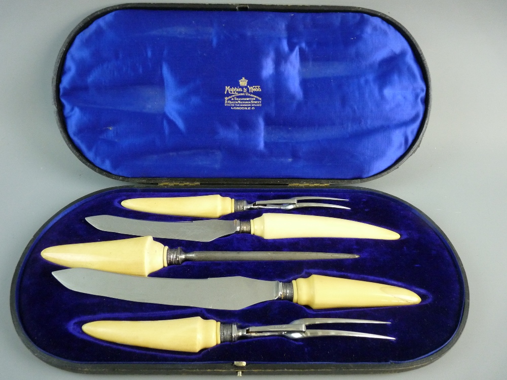 A CASED SET OF IVORY HANDLED CARVER STEELS for Mappin & Webb in a fitted case with hallmarked silver