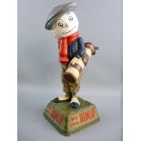 A DUNLOP CADDY GOLFING FIGURE, mounted on a naturalistic square base to inset panels with raised