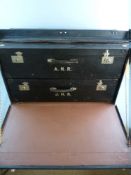 A VINTAGE CAR LUGGAGE TRUNK by Dunhills of London having clip fasteners and central lock, drop