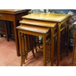 A SET OF THREE EDWARDIAN CROSSBANDED AND INLAID MAHOGANY TABLES having square galleried sides and