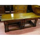 A NEST OF THREE WELL COLOURED RUSTIC STYLE COFFEE TABLES being a Long John table, 106 cms long and a