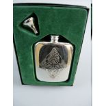 A BOXED ELECTROPLATED SCOTTISH MADE HIP FLASK with Celtic style decoration complete with funnel