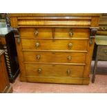 A VICTORIAN MAHOGANY CHEST of three long and two short drawers and with a long top drawer, all