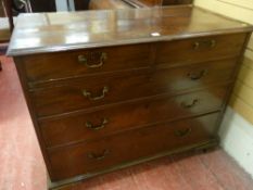 A GEORGIAN MAHOGANY CHEST of three long and two short drawers with brass swan neck handles, 105