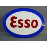 A PERSPEX OVAL ESSO GARAGE SIGN, 60 cms wide approximately