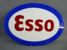 A PERSPEX OVAL ESSO GARAGE SIGN, 60 cms wide approximately