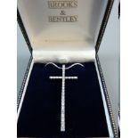 A WHITE METAL SNAKE STYLE NECK CHAIN with cz crucifix by Brooks & Bentley, 10.8 grms