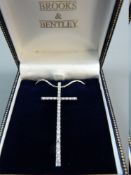 A WHITE METAL SNAKE STYLE NECK CHAIN with cz crucifix by Brooks & Bentley, 10.8 grms