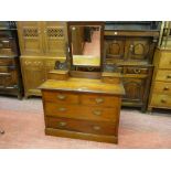 AN EDWARDIAN MAHOGANY DRESSING TABLE with two long and two short drawers