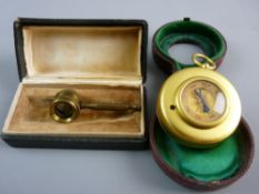 A HARRODS LIMITED GILT BRASS CASED TRAVEL COMPASS AND BAROMETER in original fitted case along with