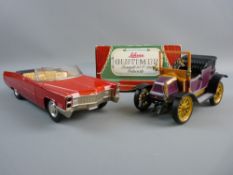 A SCHUCO CADILLAC AND OLD TIMER VEHICLE, boxed, plastic red convertible no. 5505, 'Made In Germany',