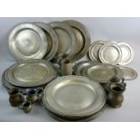 SEVENTEEN ANTIQUE PEWTER PLATES, five tankards and two jugs, various diameters to include one at