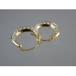 A PAIR OF NINE CARAT GOLD CRESCENT EARRINGS with white metal decoration, 1 grm