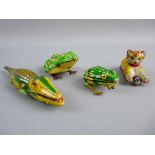 FOUR VINTAGE TINPLATE ANIMALS to include a friction drive kitten with ball, a Gama US Zone,