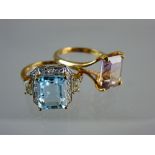 A NINE CARAT GOLD DRESS RING with large oblong pink stone, 3.3 grms total and a nine carat gold