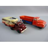 TWO GERMAN TINPLATE CLOCKWORK VEHICLES including a Heinrich Wimmer HWN-1950 bus, bakelite cab