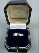 A NINE CARAT GOLD DOUBLE BAND DRESS RING with tiny diamonds, 2.6 grms