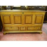 A 19th CENTURY OAK AND CROSSBANDED MAHOGANY MULE CHEST, the three plank lift-up lid with bull nose