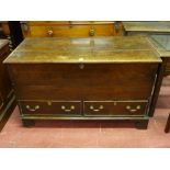 A WELL COLOURED ANTIQUE OAK MULE CHEST, the three plank top with bull nose moulding, opening to