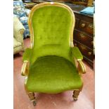 A MAHOGANY FRAMED VICTORIAN OPEN ARMCHAIR with green dralon button backed upholstery and on turned