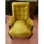 AN EDWARDIAN MAHOGANY ARMCHAIR, a button backed open armchair with turned front supports