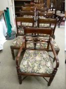 A SET OF NINE (EIGHT PLUS ONE) WILLIAM IV MAHOGANY DINING CHAIRS having a carved top rail, a