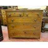 A 19th CENTURY OAK CHEST of three long and two short drawers with turned wooden knobs, 112 cms wide