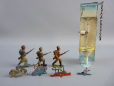 TINPLATE TOYS to include an overhead cistern flush toilet, 17.5 cms high, possibly French