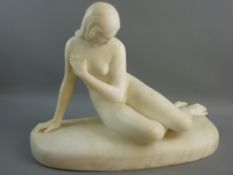 A LARGE CARVED ALABASTER FIGURE of a reclining nude female, pensive in appearance, her left arm held