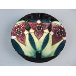 A BOXED MOORCROFT MODERN PATTERN PIN DISH, 11.5 cms diameter, impressed factory marks with