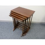 AN EDWARDIAN QUARTETTO OF MAHOGANY TABLES with beaded top decoration, turned slender supports and