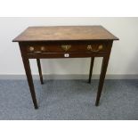 AN ANTIQUE OAK SINGLE DRAWER SIDE TABLE having a shallow crossbanded top and drawer, cock beaded
