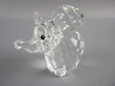 A BOXED SWAROVSKI CRYSTAL GLASS BABY ELEPHANT