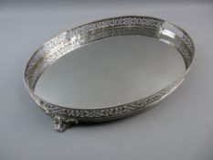 A HALLMARKED SILVER TWO HANDLED OVAL SERVING TRAY with pierced gallery border on four scrollwork