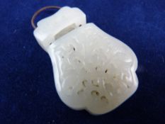 A CHINESE WHITE JADE PIERCED PERFUMIER, 3.75 cms long