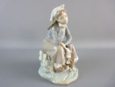 A LLADRO FIGURE of a young seated girl holding a doll with a basket of fruit by her side, no. C-