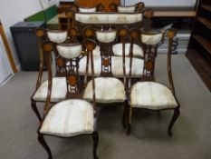 A GOOD INLAID MAHOGANY SEVEN PIECE SALON SUITE comprising pair of armchairs, four side chairs and