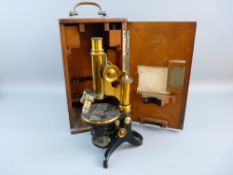 A CASED SCIENTIFIC MICROSCOPE by E Leitz Wetzlar, no. 62222, black japanned and brass lacquered,