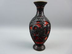 A CHINESE CINNABAR LACQUER BALUSTER VASE, 20th Century, red and black high relief carving with