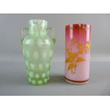 TWO VICTORIAN GLASS VASES including a vaseline twin handled example with dimple pattern and a