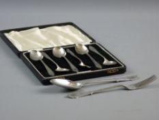 A CASED SET OF SIX HALLMARKED SILVER TEASPOONS and a fork and spoon set, hallmarks for Birmingham