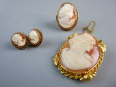 A YELLOW METAL TWIST FRAMED OVAL LADY CAMEO BROOCH, a nine carat gold dress ring with oval lady